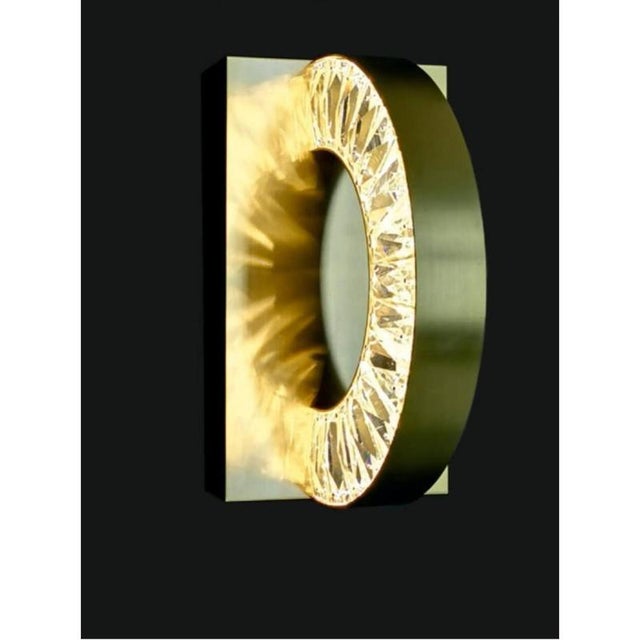 Collection orione wall lamp, gold and crystal, nca 194 by jago dimensions: d 16 x h 30 cm materials: metal, crystal....