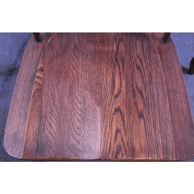 Set of 6 solid oak lyre-back Windsor chairs dating from the 1960s. Beautiful wood grain and colour.