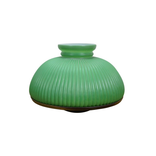 Two antique green ribbed glass student kerosene oil lamp shades with brass supports. Dimensions: 10.5" x 6" (D x H)