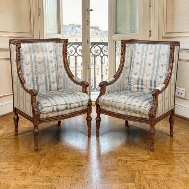 A striking pair of 19th century French Louis XVI bergères, hand-carved in walnut and found on our buying trip in Paris....