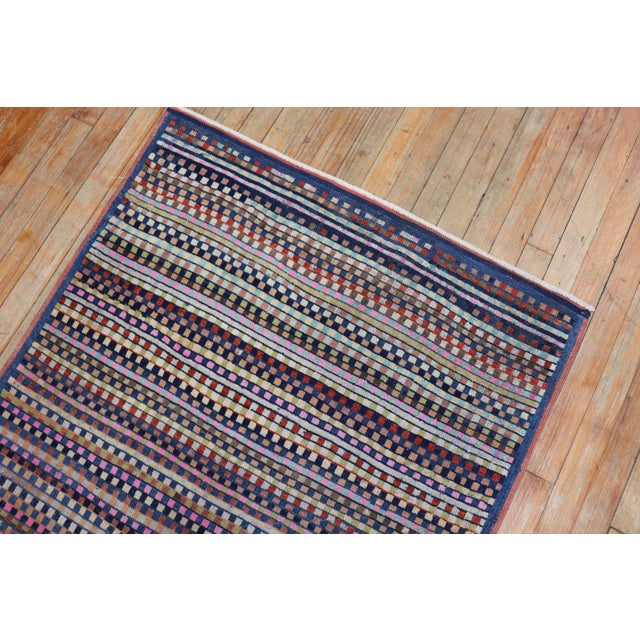 A vintage Turkish Deco rug mat with a repetitive striped small box design in an array of colors. Fun and real hip...