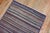 A vintage Turkish Deco rug mat with a repetitive striped small box design in an array of colors. Fun and real hip...