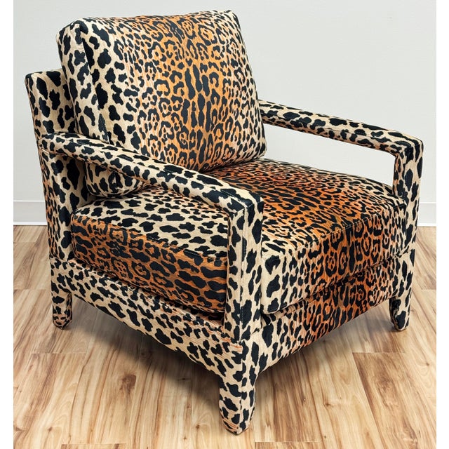Stylish parsons armchair in the style of Milo Baughman. Newly upholstered in a fun-sophisticated leopard upholstery...