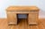 An English bleached oak Gothic Revival desk with linenfold motifs from the first half of the 19th century. This English...