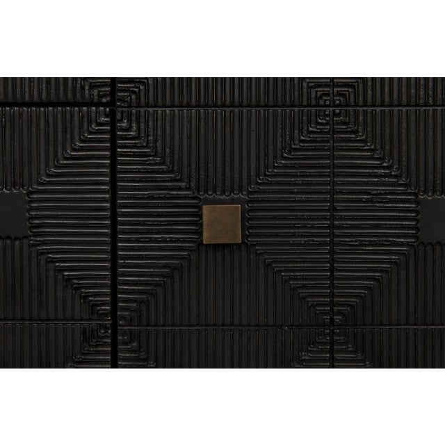 Carved of the most revered hardwood, mahogany, three sides of this exquisite dresser are adorned with decorative...