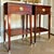 Rarely found as a matched pair, these petite Federal mahogany nightstands feature timeless Federal lines, tapered legs and...