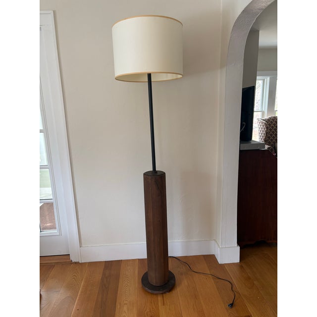 Amazing floor lamp made from old conveyor belt. This floor lamp features pine wood planks, cast iron end cap and oak base....