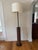 Amazing floor lamp made from old conveyor belt. This floor lamp features pine wood planks, cast iron end cap and oak base....