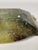 Geometric bowl in green-tinted bubble glass paste. Signed Antoine LEPERLIER. Pink and blue-tinted glass. French work,...