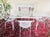 An Original MCM Atomic Radar Santorini Style Set Wrought Iron Table And Chair 5 Piece Set. The Radar chairs measure: Radar...