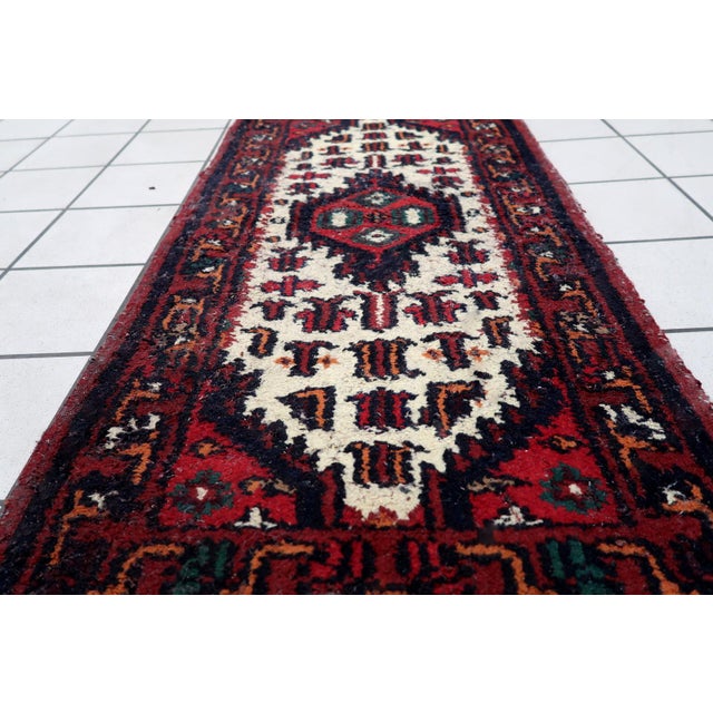 Introducing our exquisite Vintage Persian-Style Hamadan Rug, meticulously handcrafted in the Middle East during the 1970s....