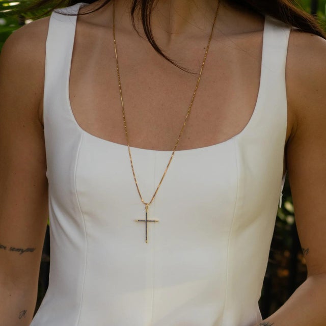 Divine Sapphire Cross Gold Pendant Necklace Elevate your everyday style with the timeless beauty and spiritual energy of...