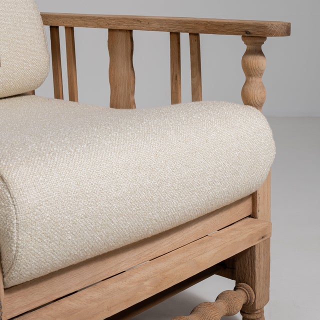 A functional and comfortable reclining armchair featuring a pull-out footrest. The oak frame provides durability, while...
