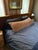 Custom made oversized velvet headboard attached to king sized bed frame in a wooden walnut. Materiel: velvet Headboard...