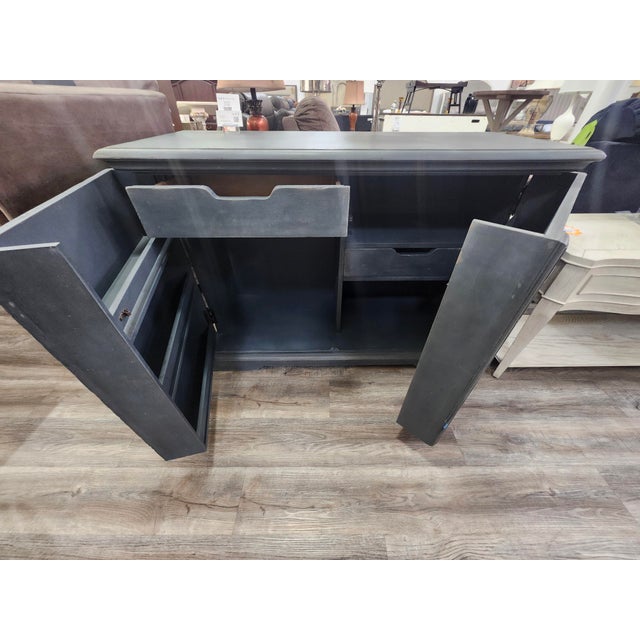 Whether you're hosting an intimate gathering or a grand soirée, this bar cabinet is designed to be your perfect...