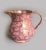 Staffordshire unusual pink lustre jug decorated with transfer printed with black outlined various sized leaves. Marked...