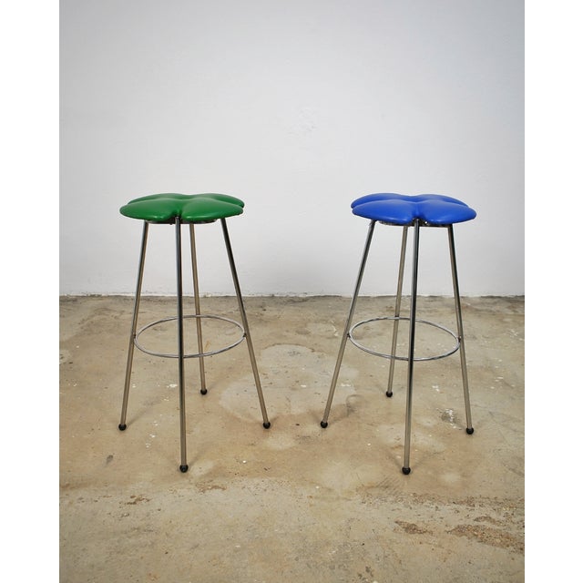 Pair of stools by the Italian brand Effezeta, 1980s. Four-leaf clover-shaped green and blue leatherette seats, chrome-...