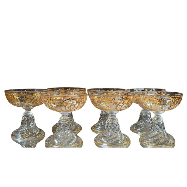 Set of 7 Saint Louis Gilded French Crystal Cluny Pattern Champagne Coupes.
