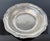 This Ralph Lauren Home “Stanton” 12.5” round pewter bowl is a discontinued serveware piece featuring a hand-hammered...