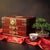 Elegant Chinese rosewood jewelry box with richly toned wood and traditional brass fittings, including engraved corner...