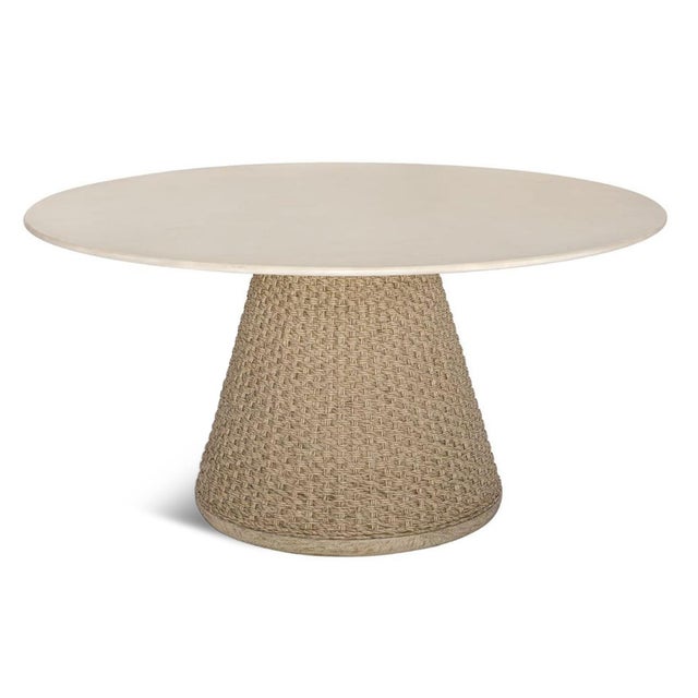 This dining table brings a refined natural touch to any dining space with its sleek, glass-reinforced concrete tabletop...