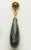 A lovely pair of faceted, long briolette labradorite drop earrings with an 18K gold leaf-motif over the top and 18K gold...