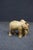 Composite elephant sculpture featuring a mother and calf standing closely together with detailed texturing and curved...
