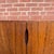 Danish modern rosewood credenza by Omann Jun, with beautifully figured rosewood grain across the front, top and sides. Two...