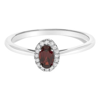 10K White Gold 5X3MM Oval Red Garnet and Diamond Accent Halo Ring (I-J Color, I1-I2 Clarity) - Ring Size 6.5 For Sale