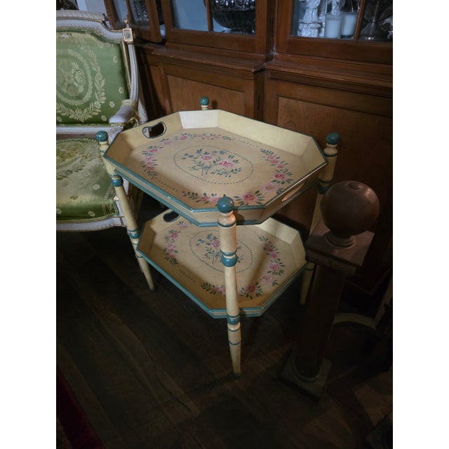 Great looking versatile two tiered tray table. Each tray can be used with or without the folding stand. This has a classic...