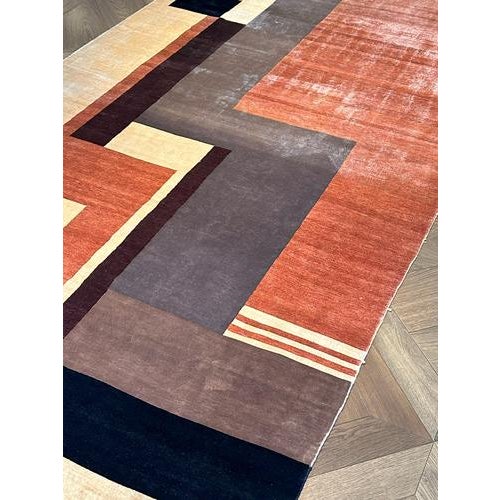 A finely hand knotted silk rug by Boccara, designed in homage to the iconic French Art Deco textile artist Ivan da Silva...