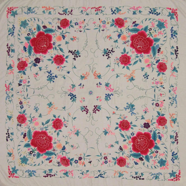 This vintage Cantonese silk shawl, measuring 4'2" by 4'2", is hand embroidered with silk threads on a silk canvas....