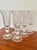 A magnificent expression of french art glassmaking. elegant and striking, these 18 cm tall biot glasses are truly...