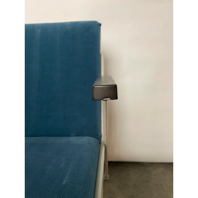 A model "Oase" chair, designed by Wim Rietveld for Ahrend de Cirkel in 1958. The chair is newly upholstered using blue rib...