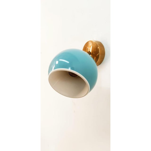 Adjustable Sconce with Blue Metal Dome, in Very Good conditions. Designed 1970 to 1979 Up to 250V (Europe/UK Standard).The...