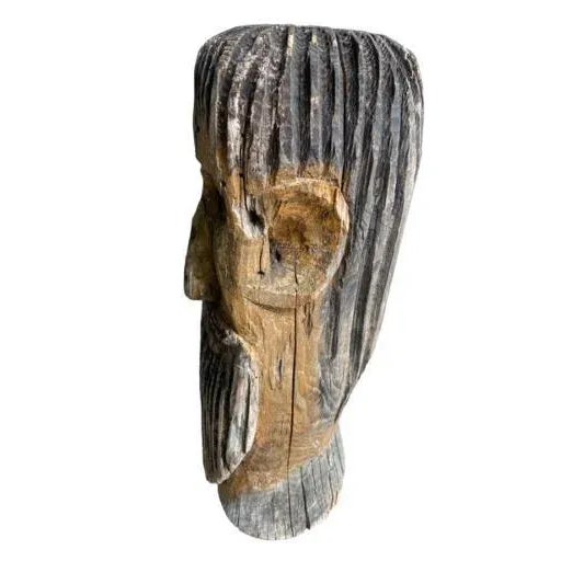 A rare early 20th century folk art beehive head called a Klotzbeuten — this piece would have had an entire body carved out...