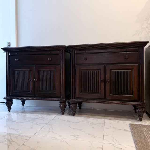 Impressive pair of oversized solid wood bedside chests by Kincaid Furniture. Substantial in both scale and construction,...