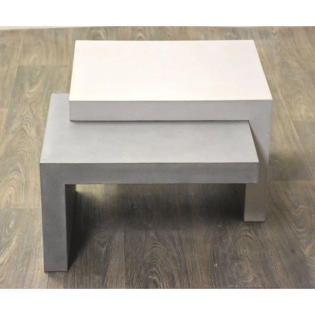 A post modern abstract end table made by Roche Bobois. 28.5” wide. 24” deep. 15” tall.