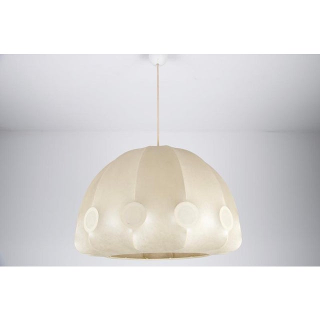 Italian cocoon pendant light from the 1960s with a softly domed silhouette and a beautifully atmospheric presence. The...