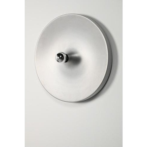 Large Space Age wall sconce that can also be used as a ceiling lamp. Minimal signs of use. Measurements Ø 50 cm; D. 16 cm....