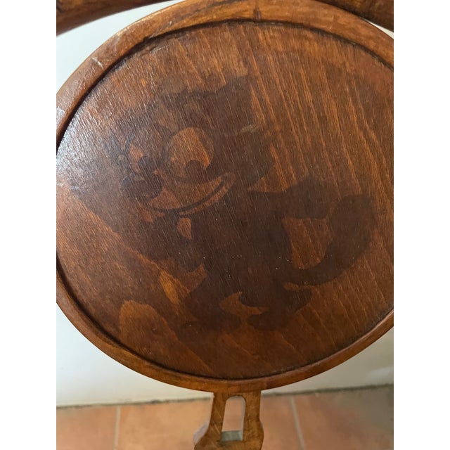 This exceptional children's highchair in classic Thonet style is a rare piece of pop culture history from the 1920s. The...