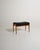 Teak stool with padded seat upholstered in black faux leather. Made by Bröderna Andersson, Sweden, 1960s. Made in Sweden...