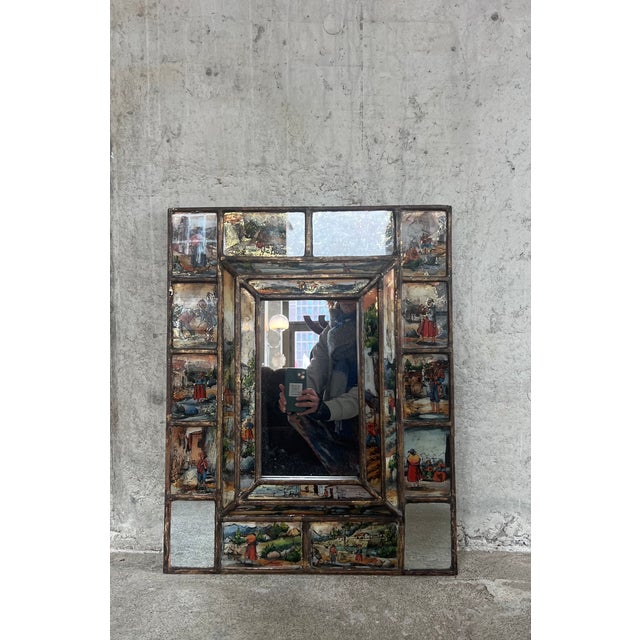 Artist unknown Italy around 1920 H 71cm W 56cm D 8cm This hand-painted mirror is a window to the past, featuring intricate...
