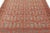 Hand-knotted in wool, this 6x12 antique Khotan runner dates to circa 1920–1930. The design features a repeating...