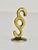 A Midcentury brass figurine, displaying a paragraph form the 1950s. Designed by Walter Bosse, executed by Hertha Baller,...
