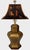 A solid brass hexagonal urn table lamp crafted by Chicago maker Frederick Cooper. The lamp features a flared six-sided...