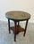 Discovered in Paris, this lovely carved oak side table features a bobbin design on the legs with a sturdy shelf on the...