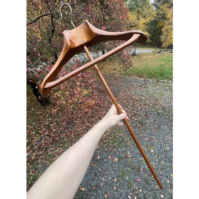 Welcome to Celestial Nonesuch For Sale Today: A pair of RARE Mid-Century Modern Italian Dovetailed Wooden Hangers with...
