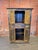 Add a soul-stirring piece of history to your home with this stunning, hand-carved solid wood cabinet. This armoire...