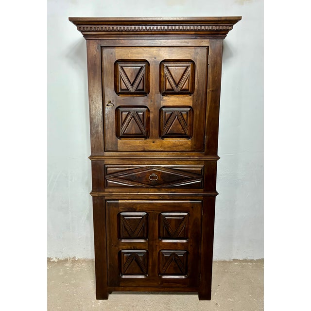 Striking Spanish cabinet from the early 20th century, crafted in solid walnut and inspired by traditional Renaissance...